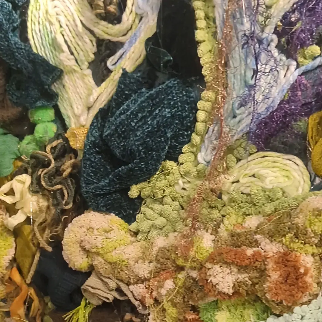 Close-up details of some of the fabric that makes up the moss wall.
